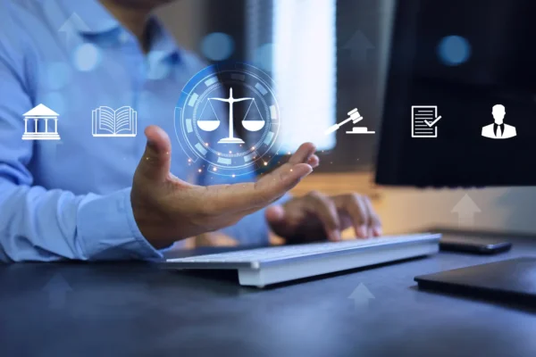 Client Data Security for Law Firms: Lawyer holding balance of justice.